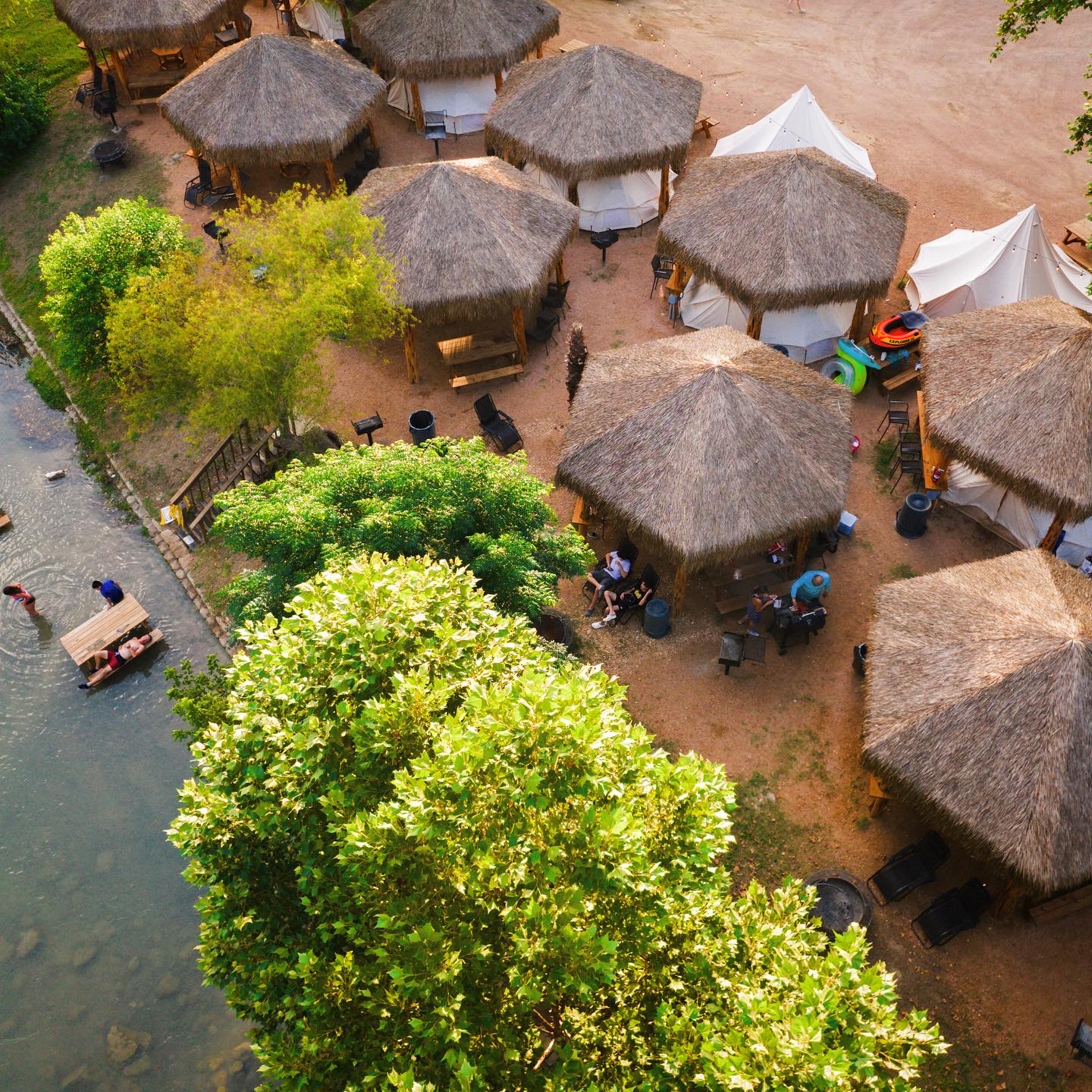 Aerial view of thatched-roof cabanas