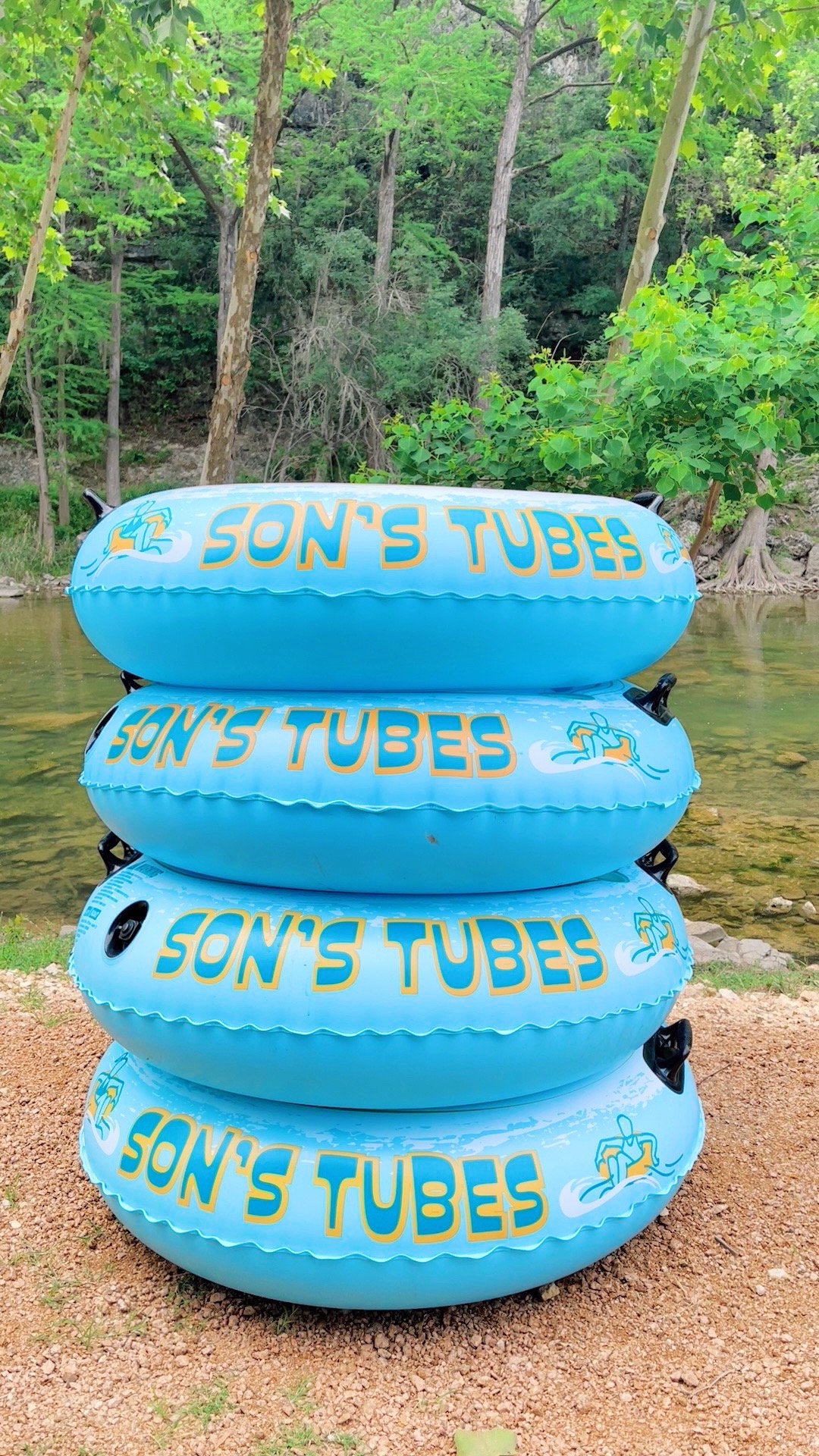 Stack of Son's Tubes by the river
