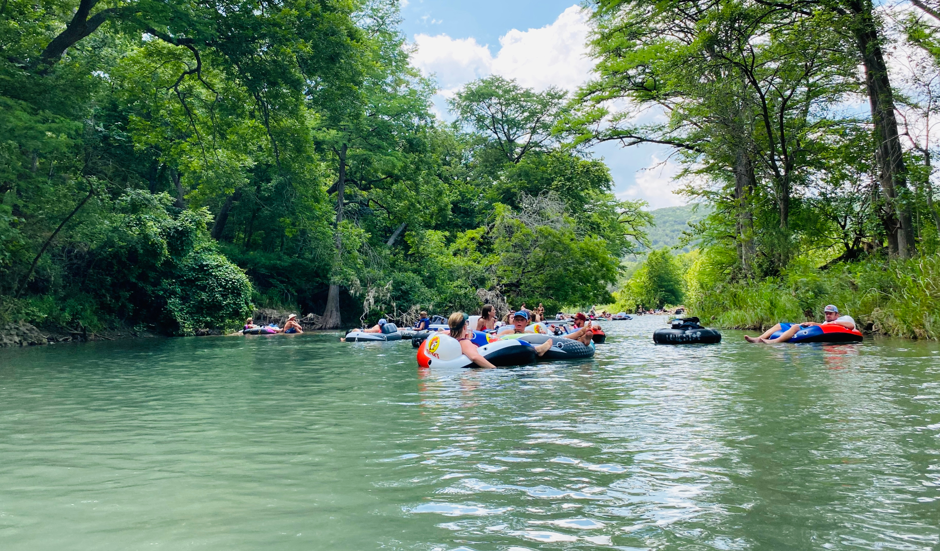 Family tubing on the crystal clear Guadalupe River